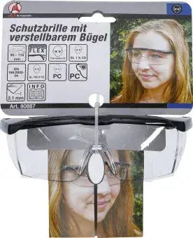 Verpackung der Schutzbrille mit verstellbarem Bügel transparent, zeigt Produktdetails und Anwendungsbeispiel mit Modell.