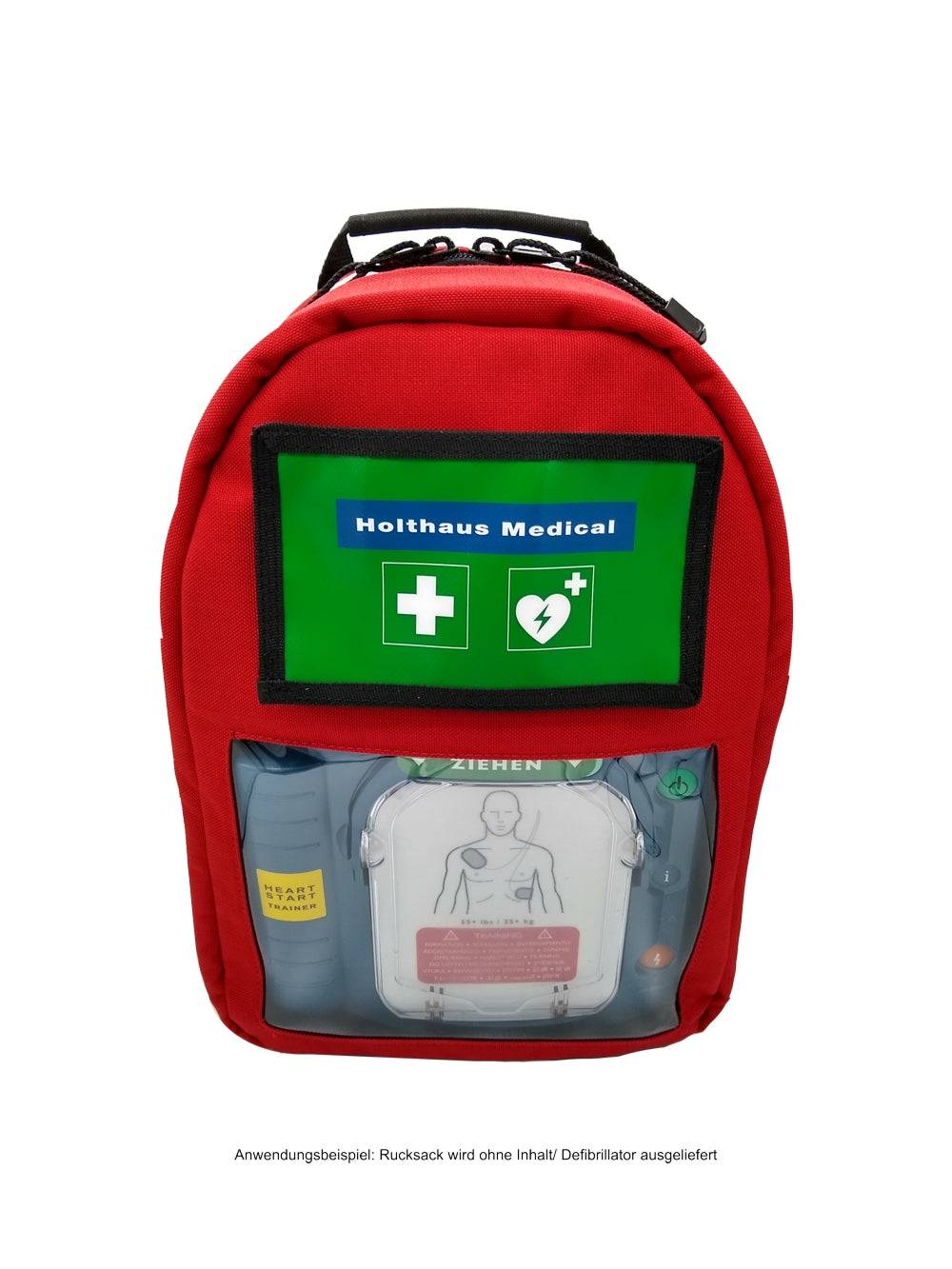 Sanitätsrucksack PARAMEDIC in Rot mit Sichtfenster und Holthaus Medical Logo, ideal für sicheren Transport von Notfallausrüstung.
