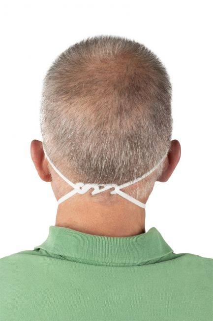 FFP2 Atemschutzmaske 5-lagig mit Halterung am Hinterkopf getragen – ergonomischer Sitz für lange Tragezeiten in Industrie & Medizin.