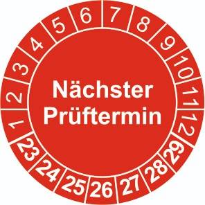 Rote Prüfplakette „Nächster Prüftermin“ mit Monatszahlen 1–12 und Jahreszahlen 23–29, ideal für Prüfkennzeichnung. Rolle mit 1.000 Stück für Bürobedarf.